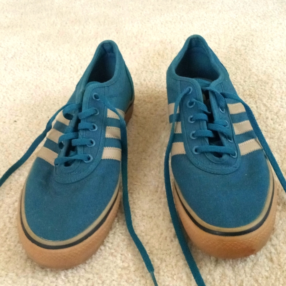 Adidas size 10 (Men) forest green with tan stripes
